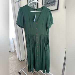 Green button up dress with pockets